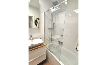 Душова шторка на ванну Besco Easy Slide 100x150 см, на 2 секції, прозоре скло, профіль хромований (PES-2S)
